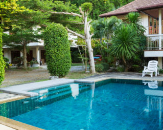 Small pool with blue bottom outdoors