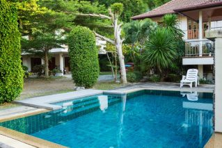 Small pool with blue bottom outdoors