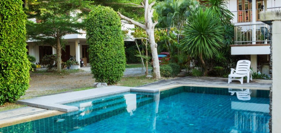 Small pool with blue bottom outdoors
