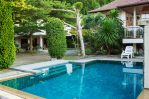 Small pool with blue bottom outdoors