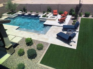 Huge Pool with Bushes and Trees on the side - Turnkey Pool Designers