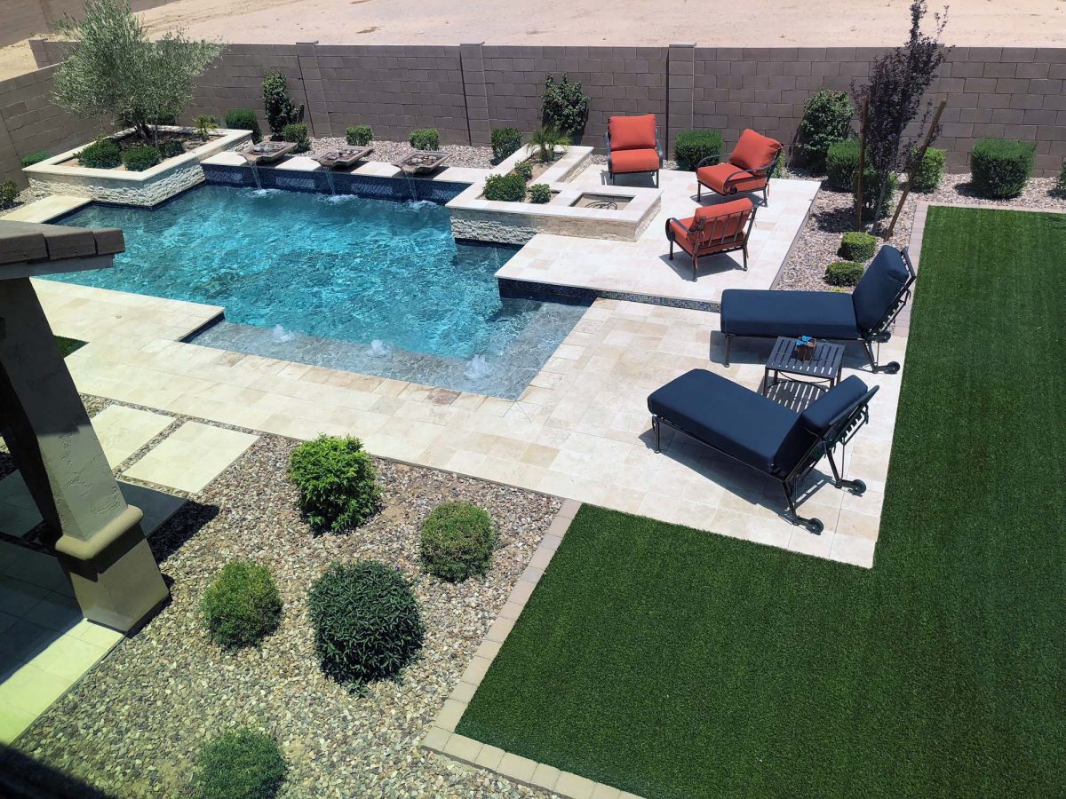 Huge Pool with Bushes and Trees on the side - Turnkey Pool Designers
