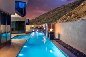 High-End Custom Swimming Pool with Waterwall Feature and Dual Water and Fire Bowls
