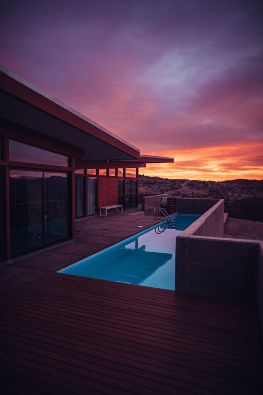 Backyard pool with clear blue water