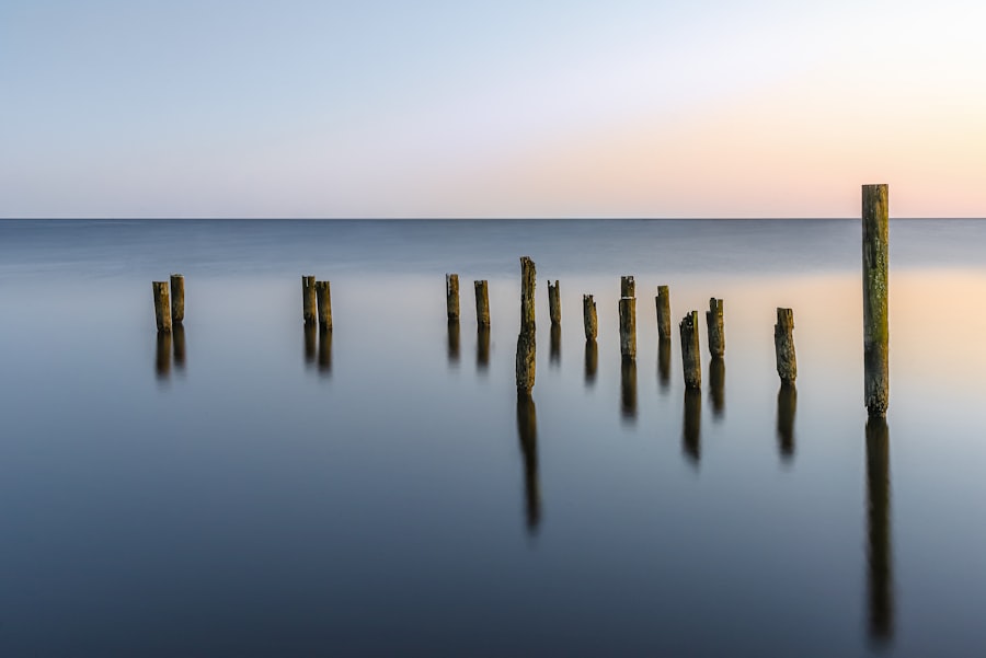 Weathered dock pilings on the Tchefuncte River at dusk near Madisonville, LA